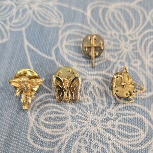 Four Miniature Gold Pins